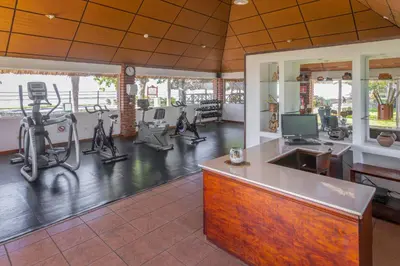 a gym with a fitness center with exercise equipment at Royal Decameron Salinitas - All Inclusive in Los Cóbanos