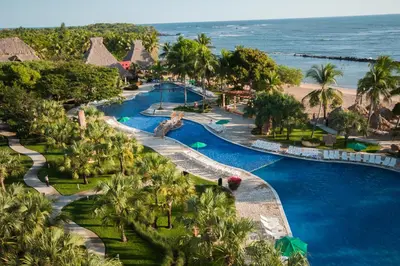an aerial view of a pool at a resort at Royal Decameron Salinitas - All Inclusive in Los Cóbanos