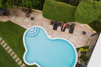 an overhead view of a swimming pool in a yard at Hotel Mirador Plaza in San Salvador