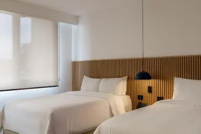 two beds sitting next to each other in a room at Best Western Plus Hotel Terraza in San Salvador