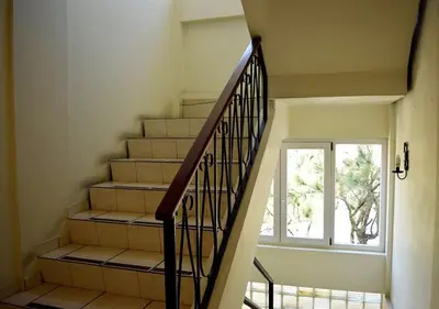 a staircase in a house with a window at Hotel Berlin in San Salvador