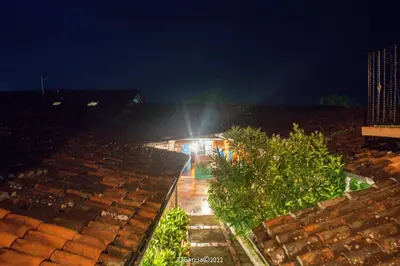 a view of a building at night at Hostal Koltin Suchitoto in Suchitoto