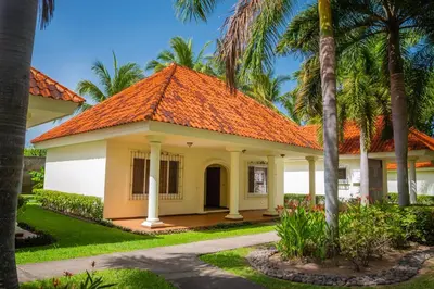 an image of a house with an orange roof at Pato Canales Hotel & Resort in San Luis