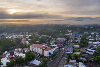 an aerial view of a city with a road at Comfort Inn Real San Miguel in San Miguel