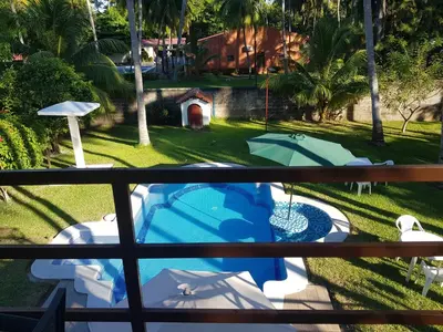 a view from the balcony of a resort with a swimming pool at Rancho villas de alicia in La Paz
