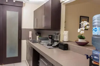 a kitchen with a counter with a blender on it at Luxury Modrn Apartment, w/amazing view, 3BR,Escalon,Exclus,Secur in San Salvador