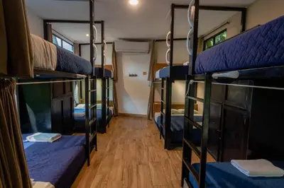 a group of bunk beds in a room at Lagarza Hostel in La Libertad