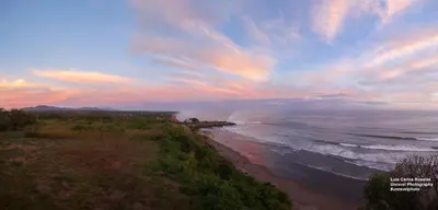 an aerial view of a beach with the ocean at Hotel Miraflores in El Cuco