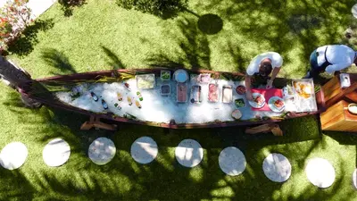 a toy train is sitting on the grass at Las Veraneras Villas & Resort in Acajutla