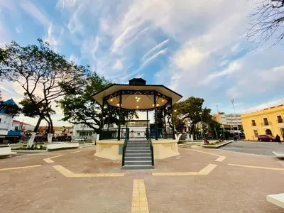 a gazebo with stairs in a parking lot at Casa Central de Santa Ana in Santa Ana