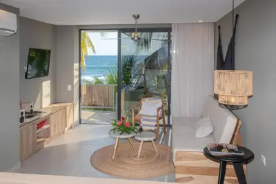 a living room with a view of the ocean at Fishermans Resort Life in La Libertad
