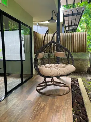 a chair sitting on top of a porch at Casa 1800 Cerro Verde in Cerro Verde