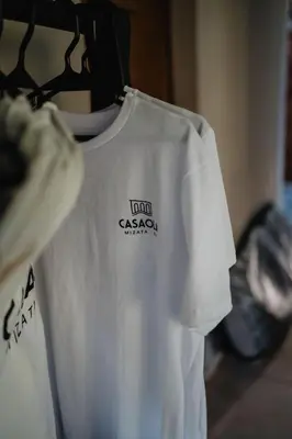 a white shirt is hanging on a rack at Casaola Mizata in Santa María Mizata