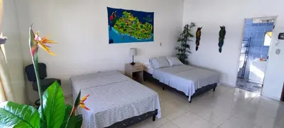 a small room with two beds and a window at Playa El Obispo A La Marea building La Libertad in La Libertad