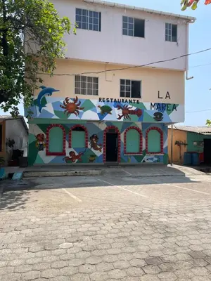 a building with a mural on the side of it at Playa El Obispo F La Libertad Playa El Obispo in La Libertad