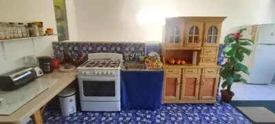 a kitchen with a stove and a sink at Playa El Obipo C La Marea building La Libertad in La Libertad