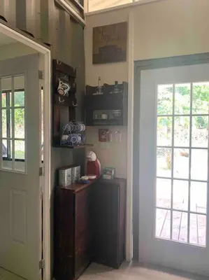 a room with a door leading to a room with a door at Wabi Sabi , casa de playa in Tamanique
