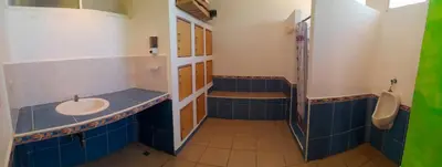 a bathroom with a sink and a shower and a toilet at Casa de Playa Bosque de Mangle en Playa El Espino in El Arco