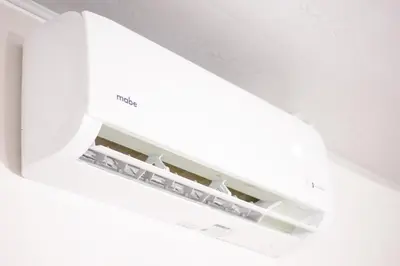 a ceiling light in a white room at Habitación Agua - Villa Valle Campo in Nahuizalco