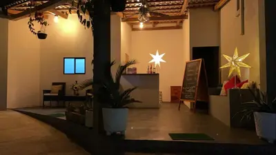 a room with plants and stars on the wall at HOTEL EL VIAJERO in La Libertad
